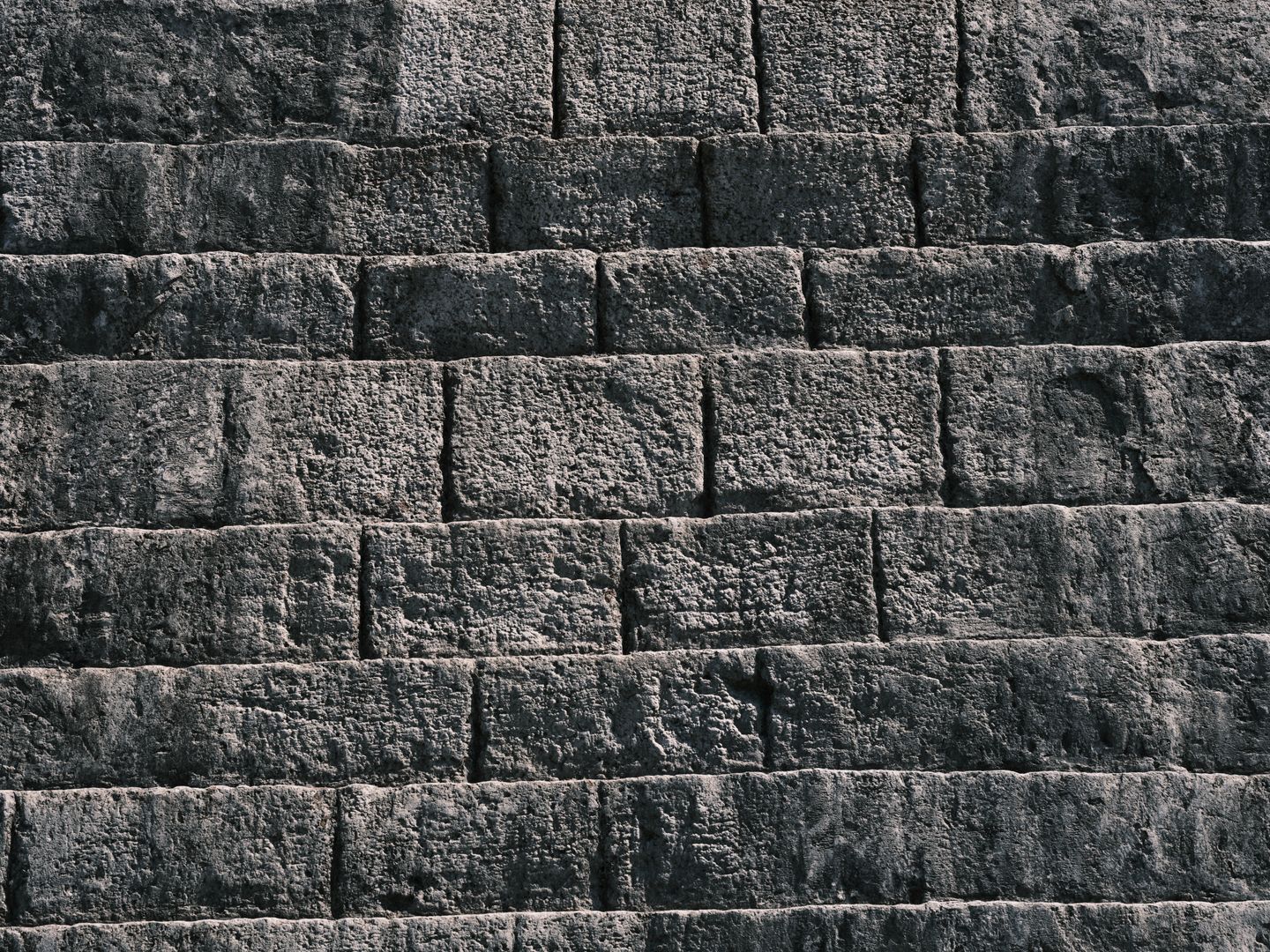 Terraced concrete block retaining wall