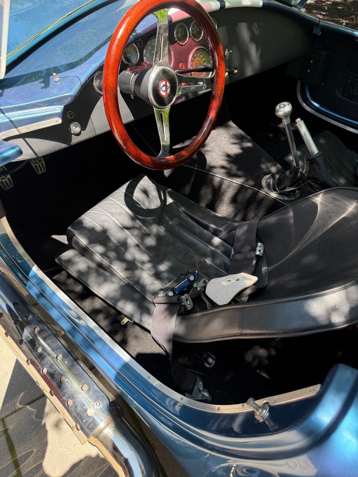 Detailed classic interior, wood wheel and leather seats