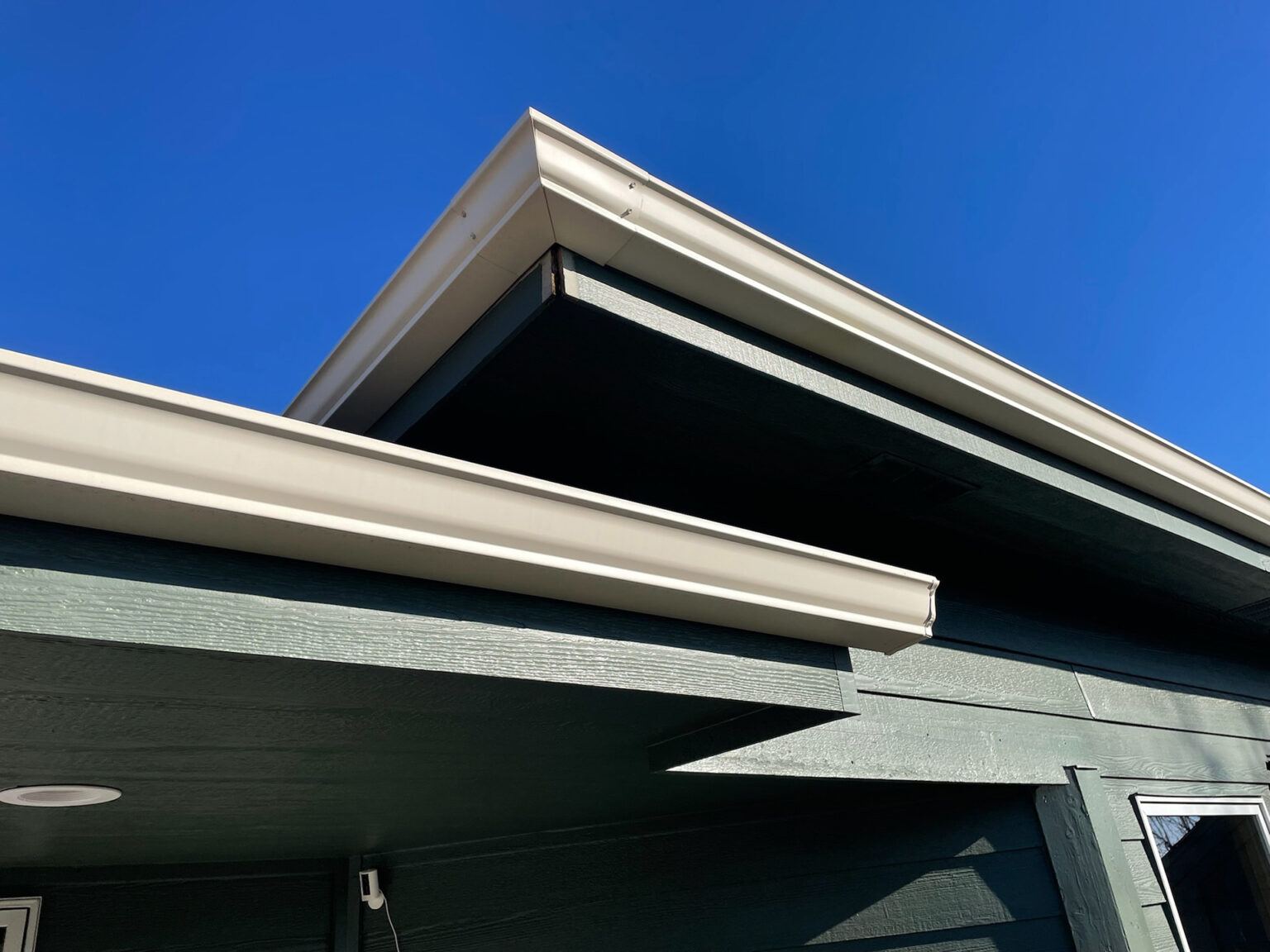 Seamless gutter and downspout closeup