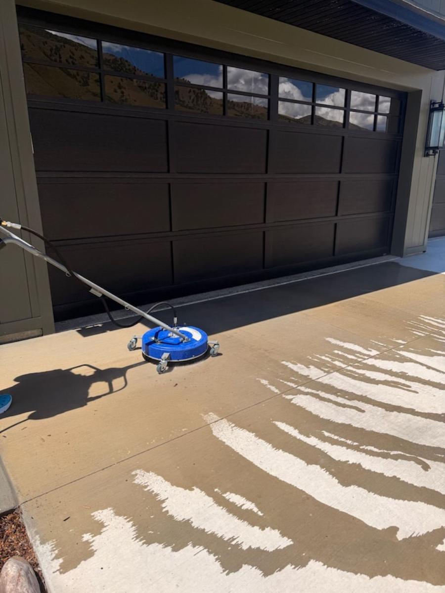 Surface cleaner on a driveway before sealing