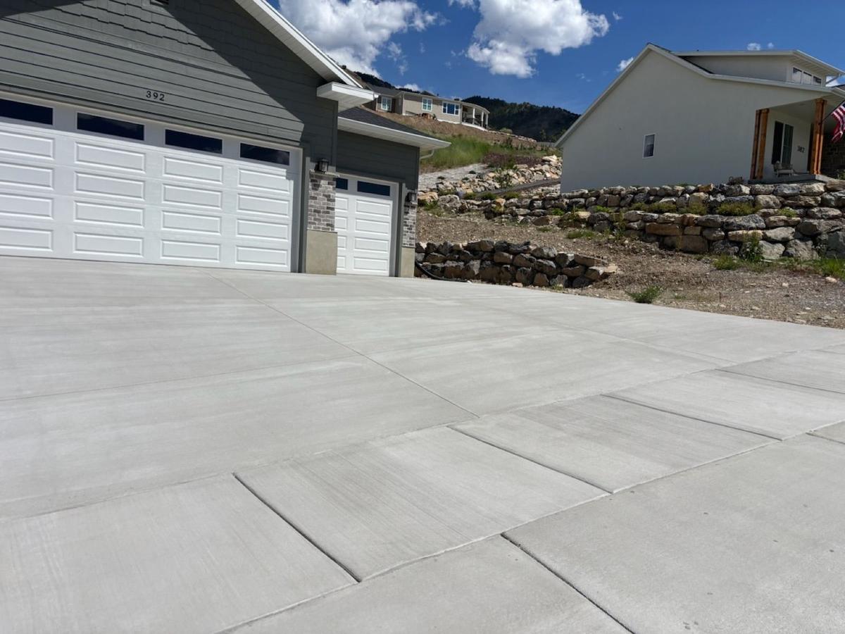Same driveway after cleaning and penetrating concrete sealing