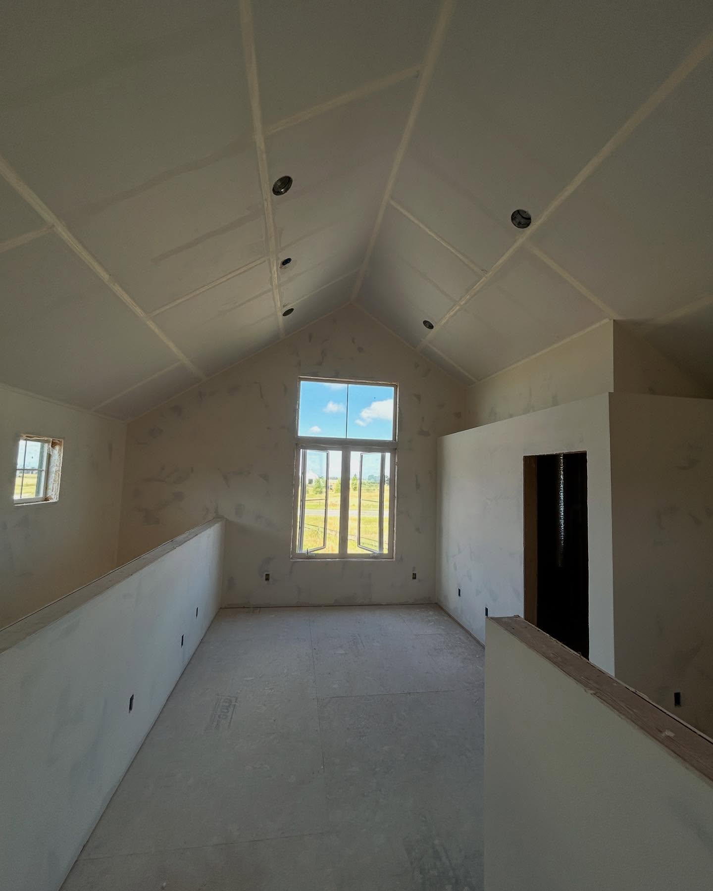 Drywall finishing crew on a Gallatin Valley job site