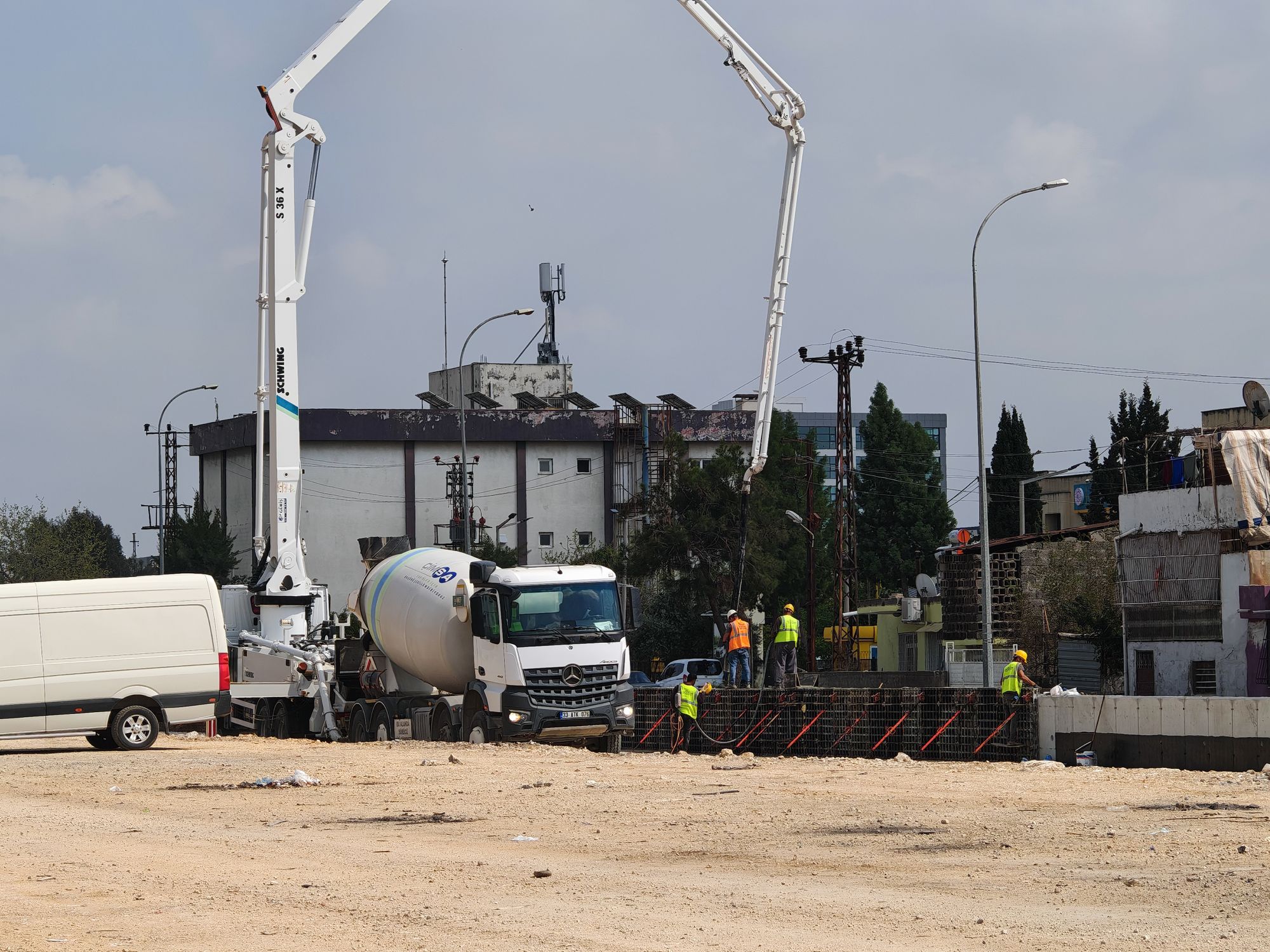 Fresh concrete being placed and finished on a jobsite