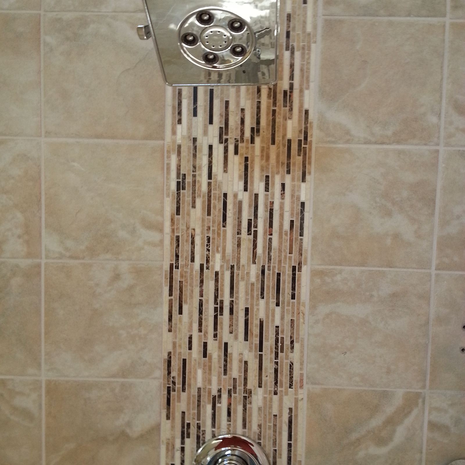 Custom Stone Tile mosaic shower accent, real project photo