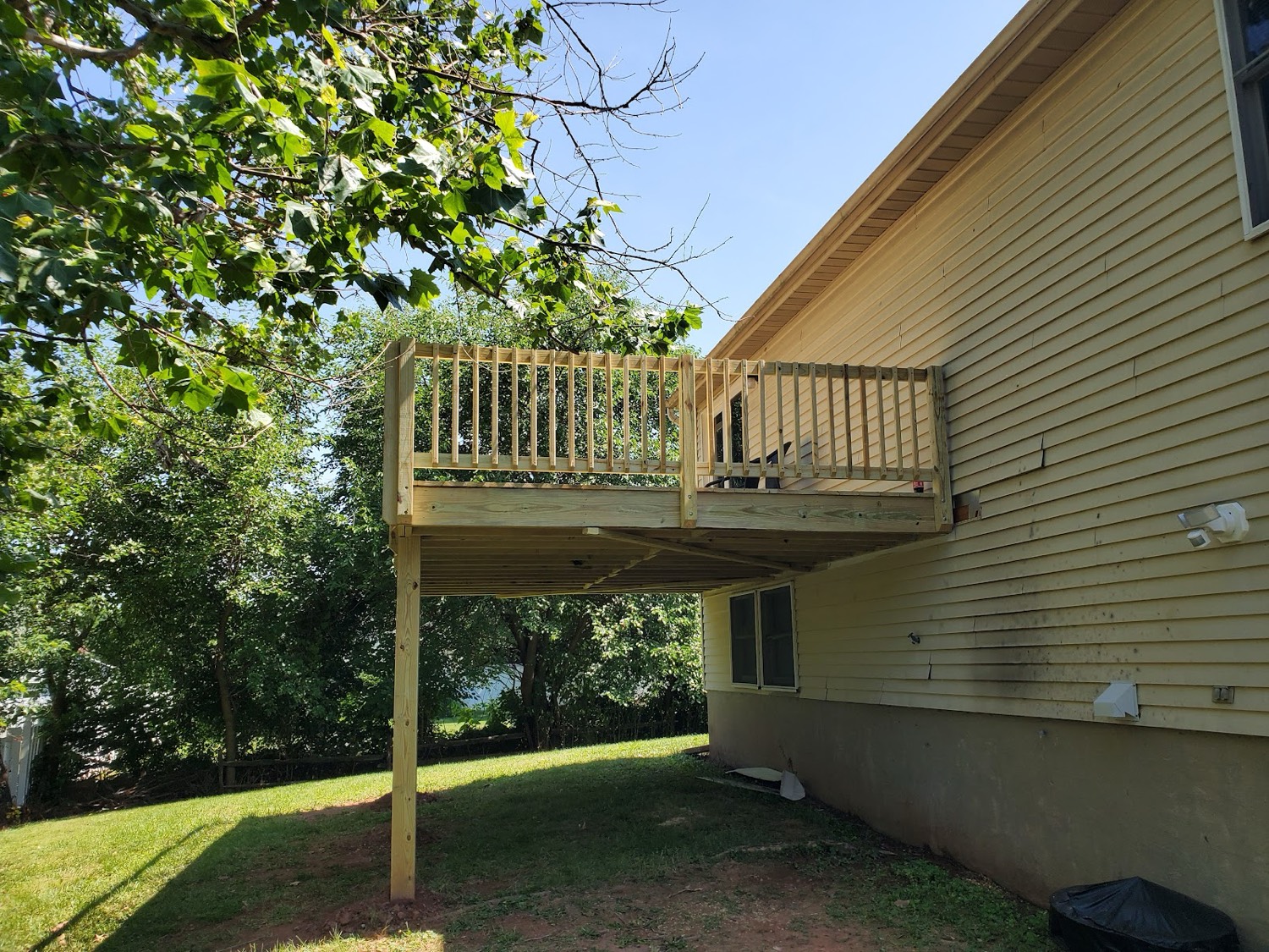 Elevated wood deck addition built by Deck It Out, LLC in Washington County, MD