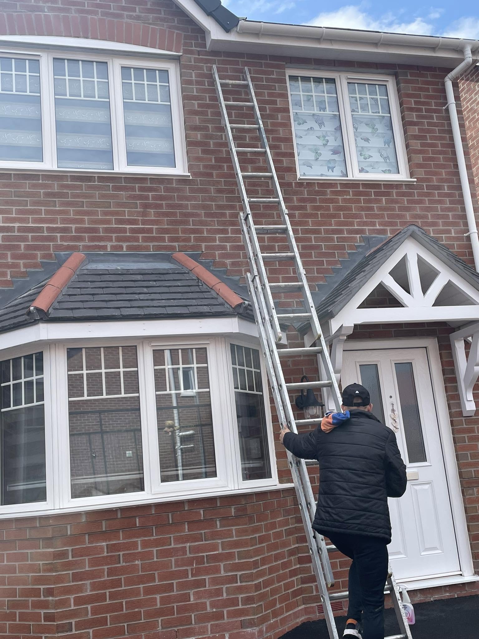 Handyman repairing a door in a home