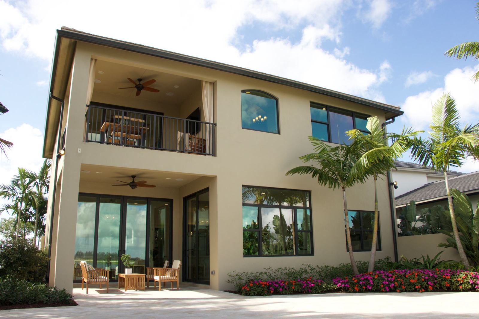 Two-storey Florida home with palm trees