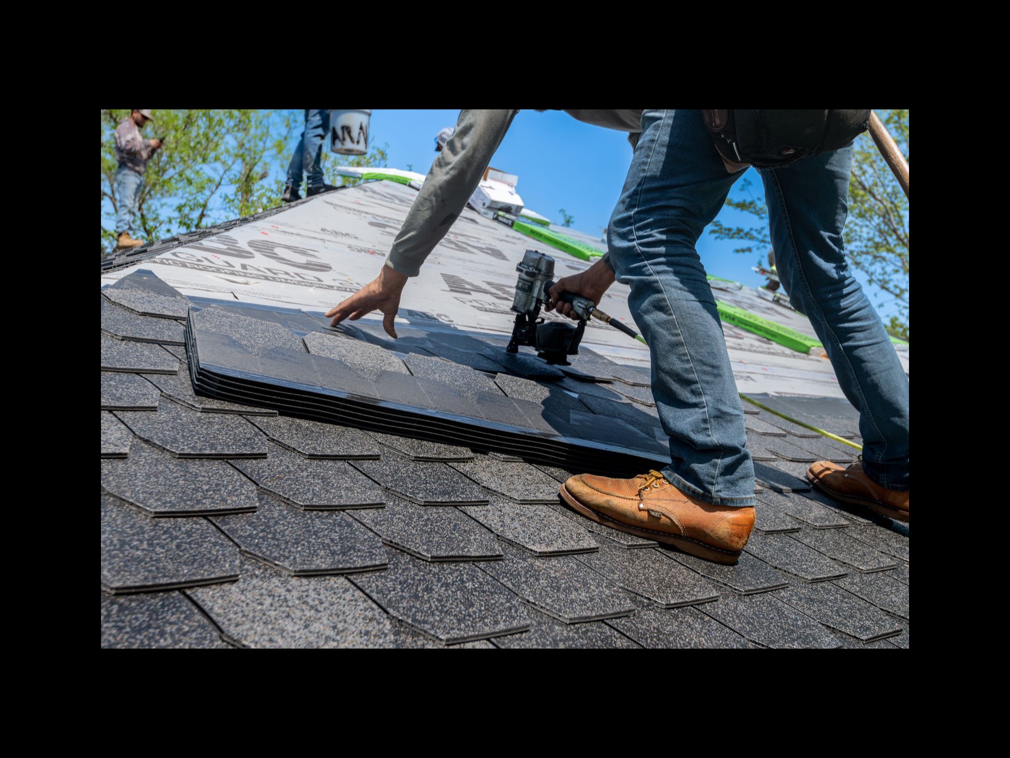 Crew working on a roofing project