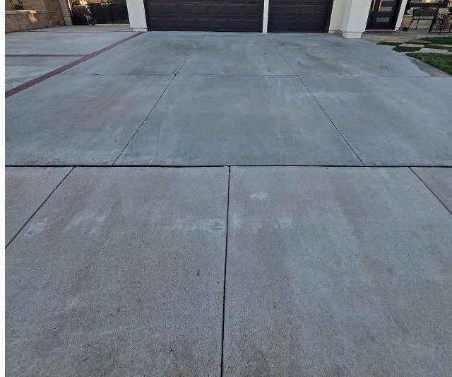 Clean driveway after pressure washing