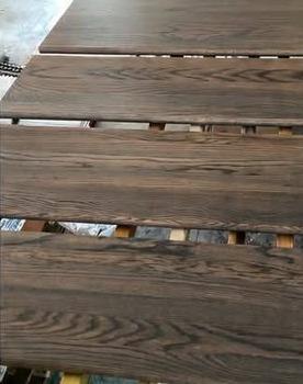 Stained deck and wood surface by Lewis & Lewis Painting Inc.