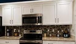 Cabinet Painting by Lewis & Lewis Painting Inc.