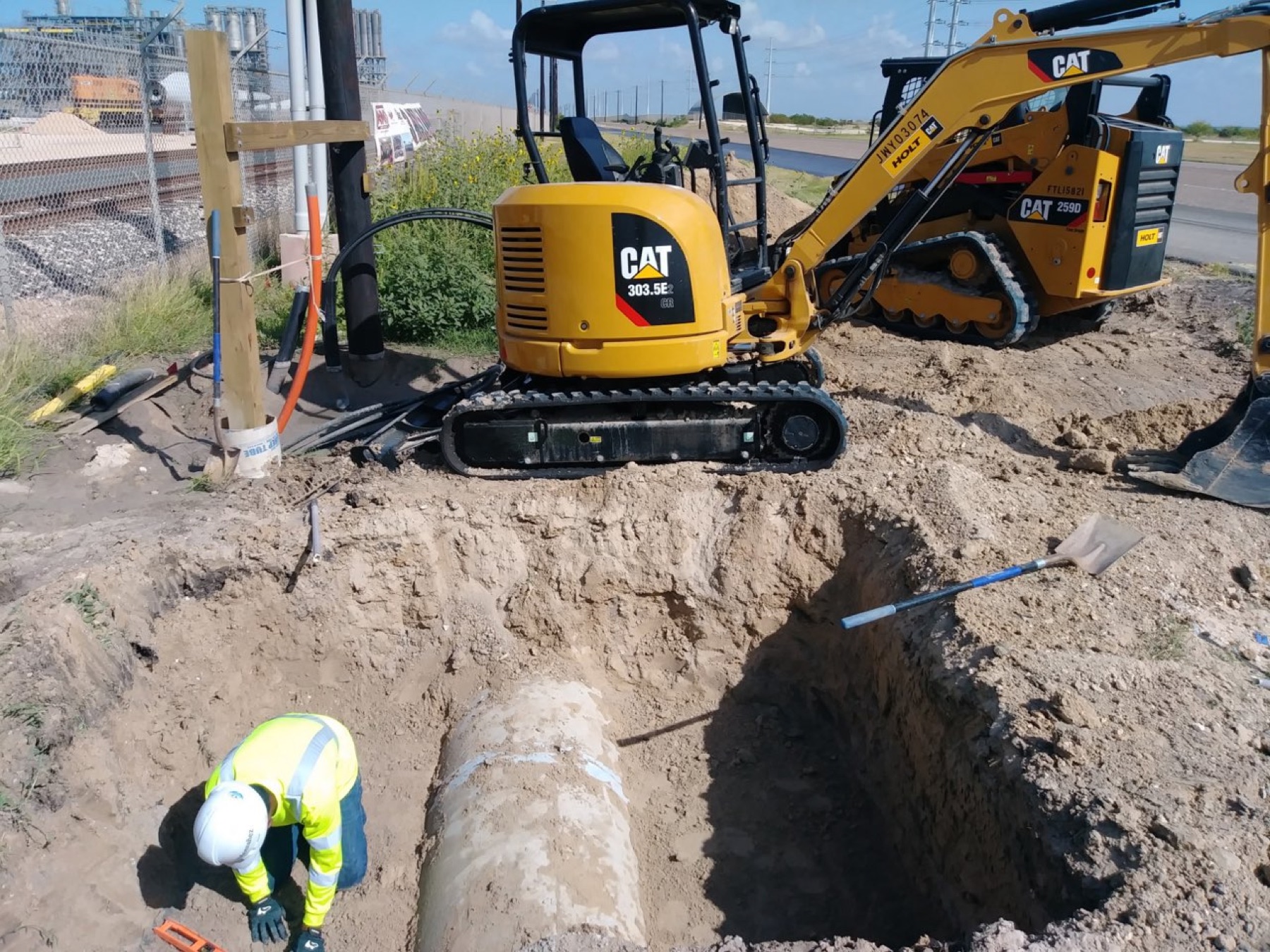 Pipe set in an open bore trench