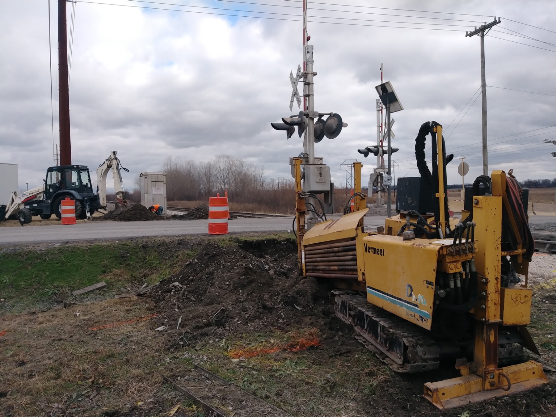 Directional drill rig boring at a railroad crossing