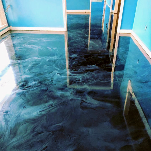 Finishers screeding a fresh slab