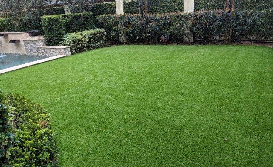 Artificial lawn next to a pool area