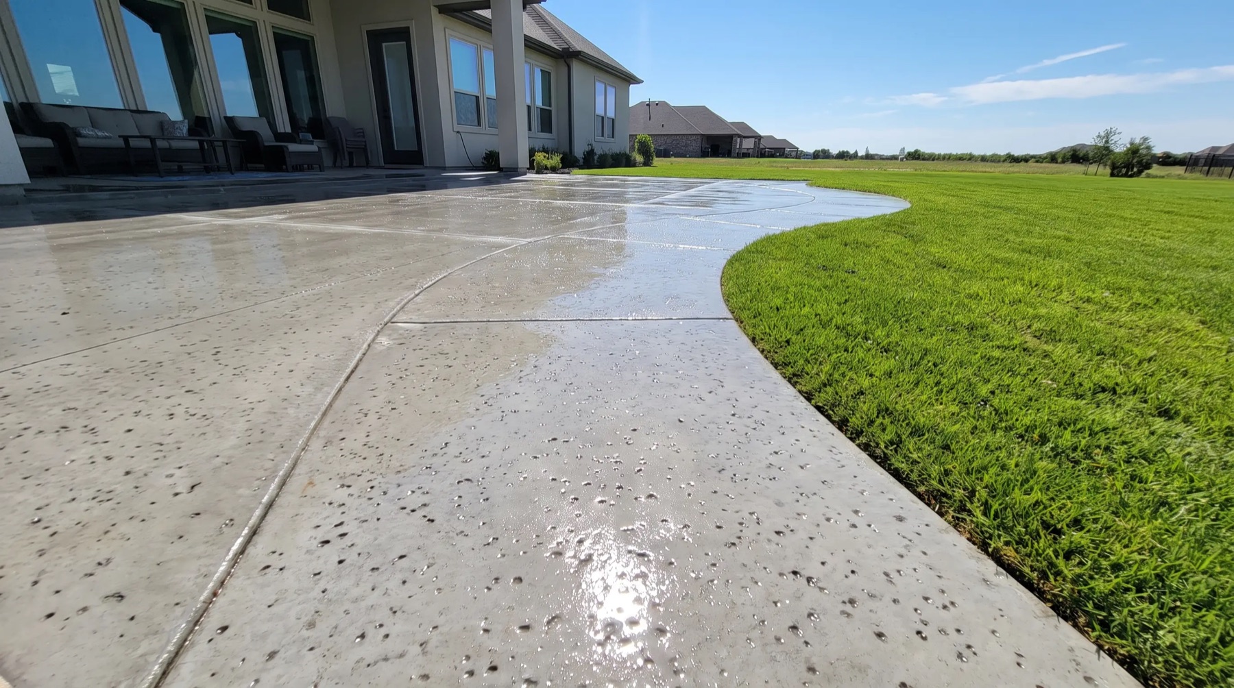 Freshly pressure washed concrete patio in the San Antonio area