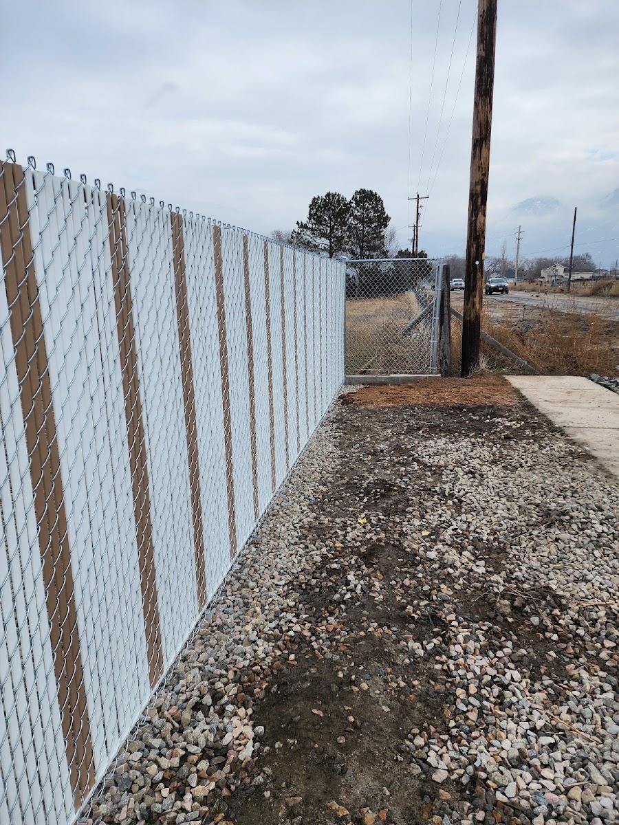 Privacy-slat chain-link fence installed by Roadhouse Fence