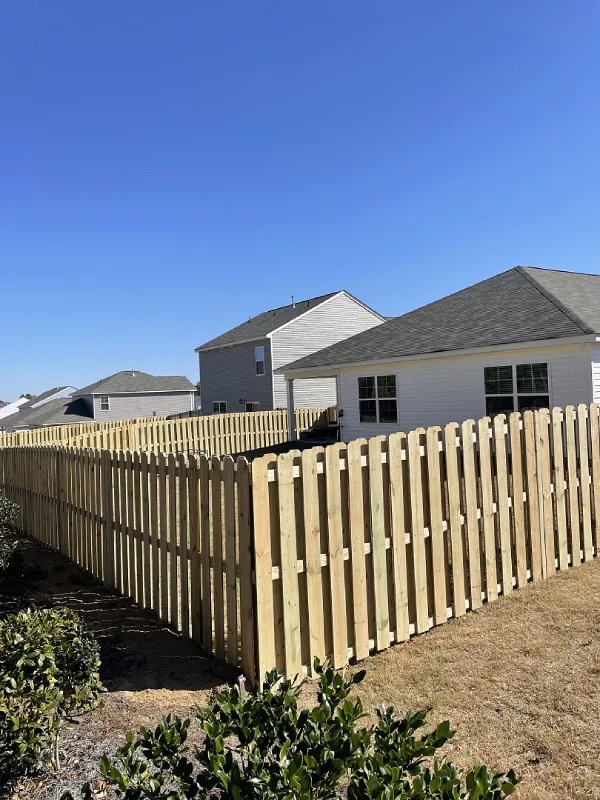 Crew installing a fence