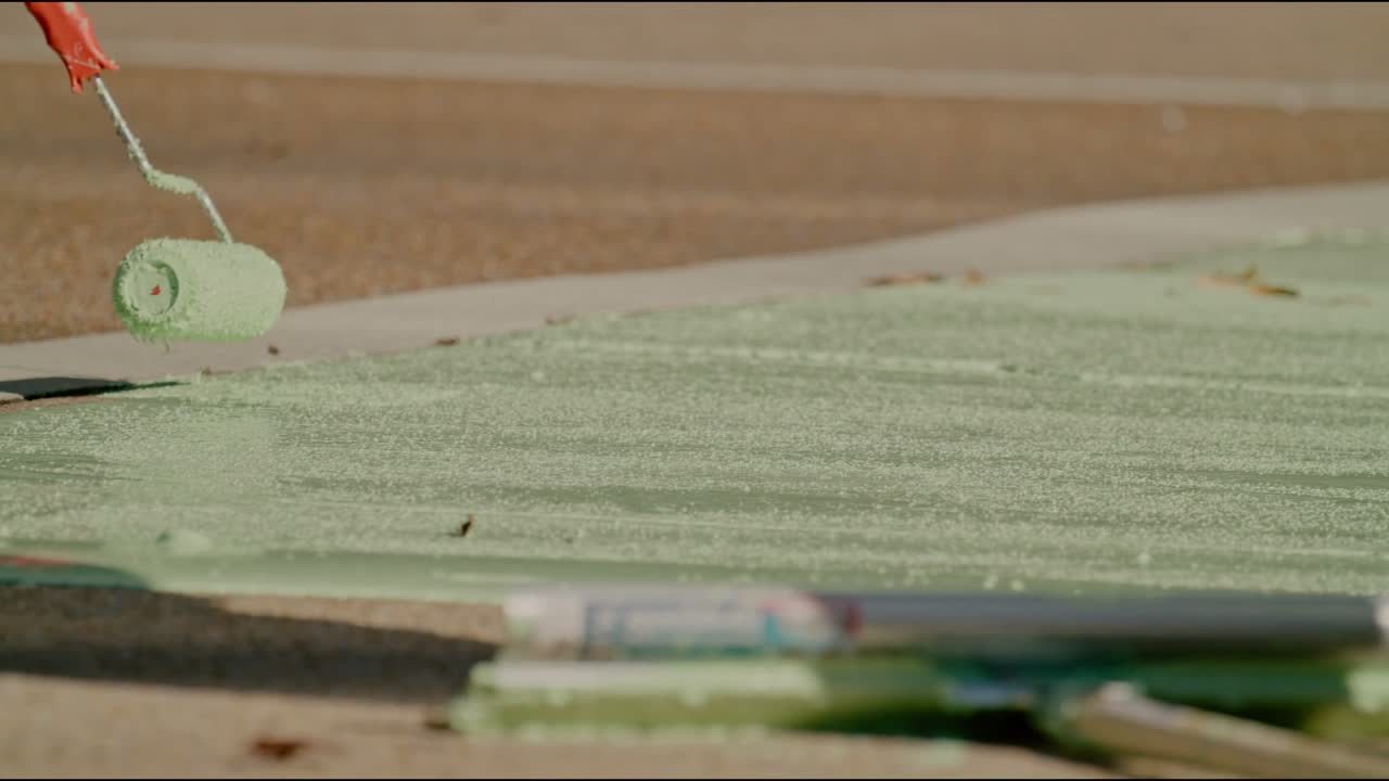 Applying a protective coating to a concrete surface