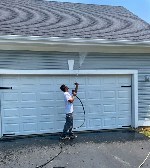 Pressure washing in progress