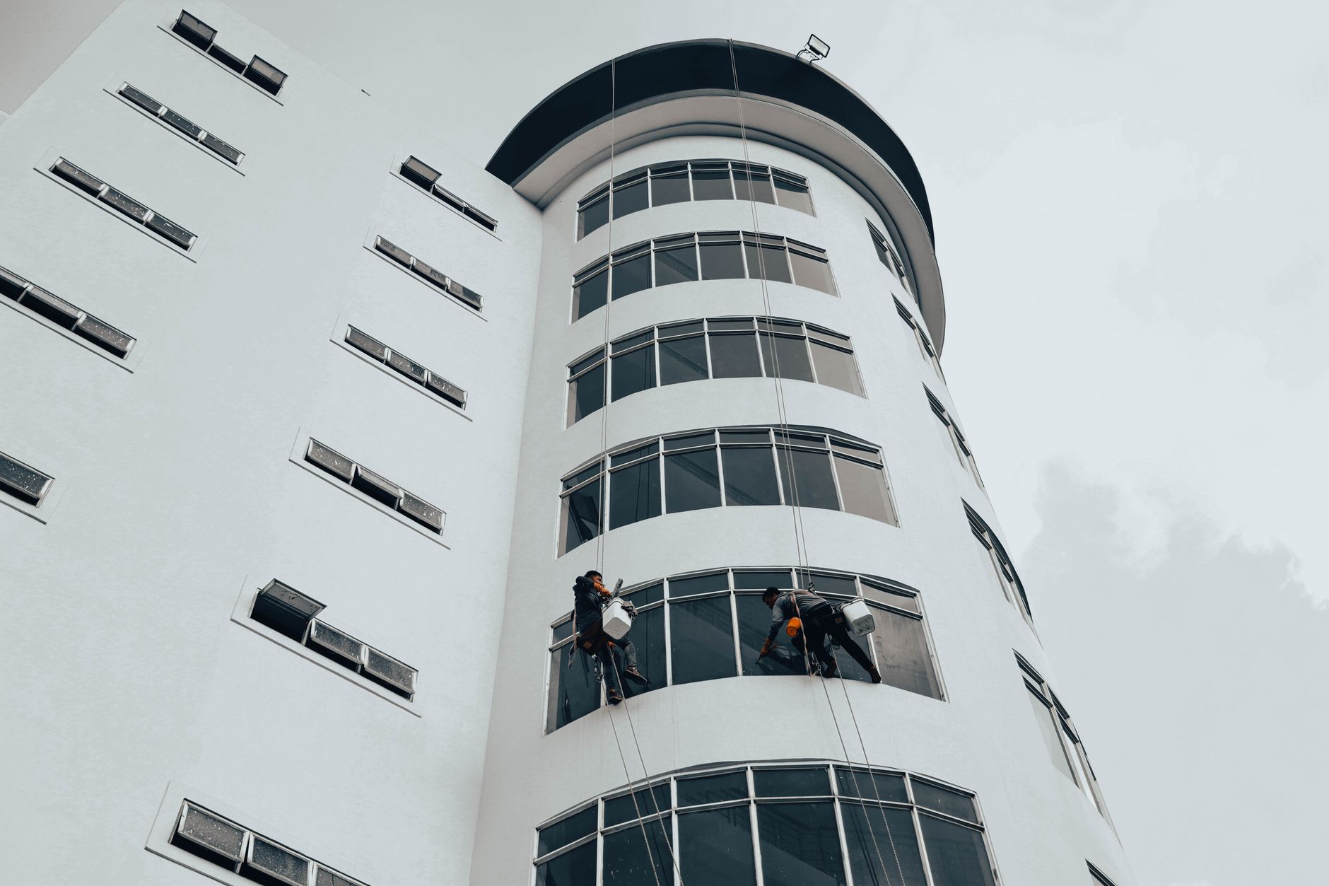 Crew cleaning windows on the job