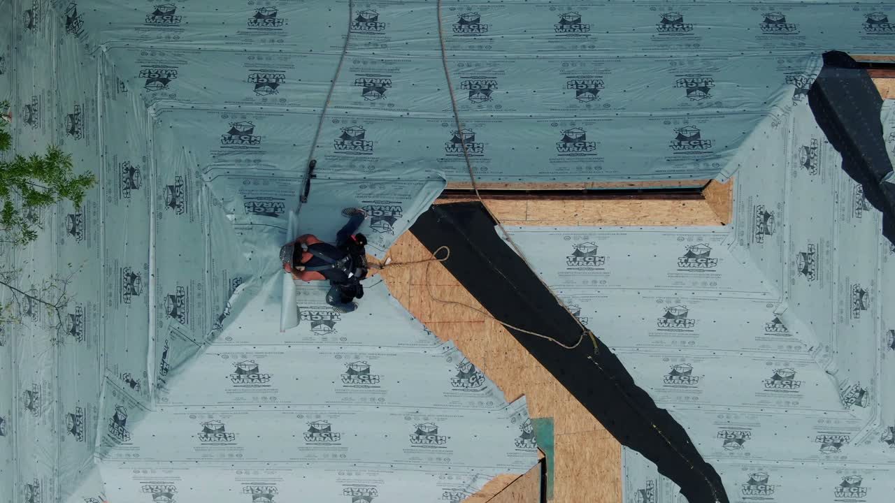 Roofer installing roof decking